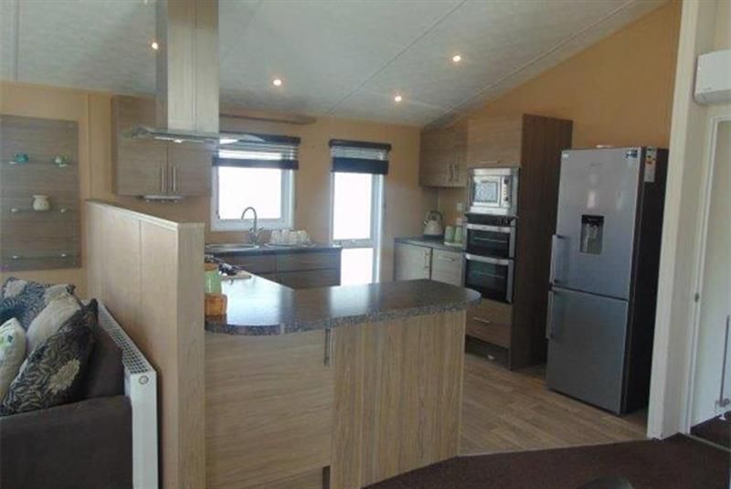 2 bed lodge for sale in Golden Sands Holiday Park, Sandy Cove, North Wales LL18, £100,000