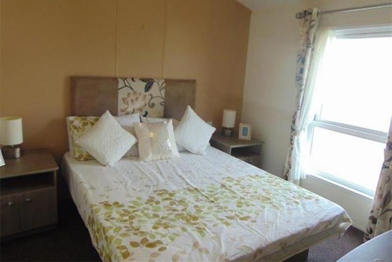 2 bed lodge for sale in Golden Sands Holiday Park, Sandy Cove, North Wales LL18, £100,000