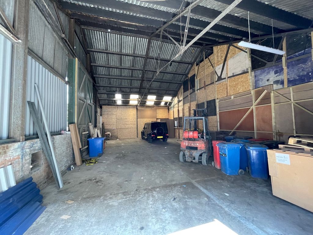 Warehouse to let in Coombe Road, London NW10, £54,000 pa